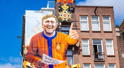 Amsterdam Cafe Unveils Kings Day Mural Honoring Marjolein Faber's Ribbon Gate Amsterdam Cafe Unveils Kings Day Mural Honoring Marjolein Faber's Ribbon Gate