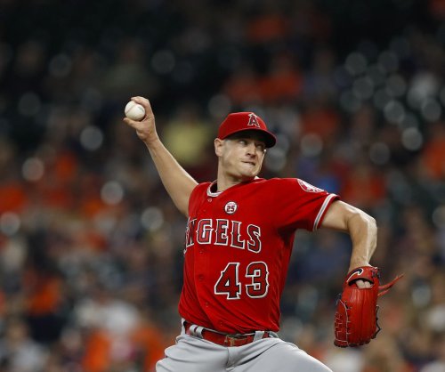 Angels Beat White Sox In Rain-Delayed Game Thanks To Pari's Late Homer Angels Beat White Sox In Rain-Delayed Game Thanks To Pari's Late Homer
