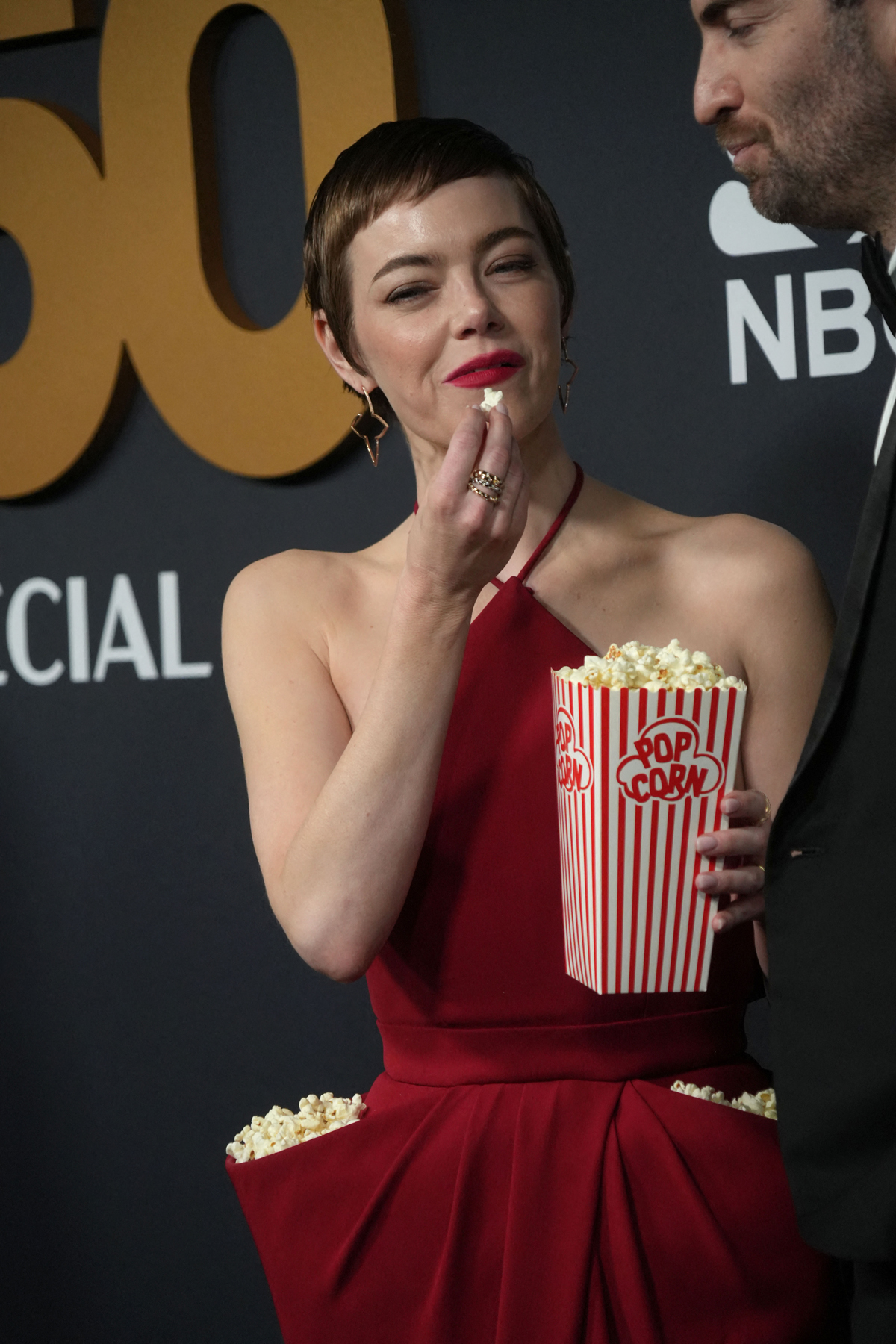 Emma Stone's Popcorn Dress: Stunning Look At SNL's 50th Celebration Emma Stone's Popcorn Dress: Stunning Look At SNL's 50th Celebration