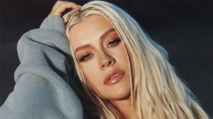 Is Christina Aguilera Aging Backward? Her Latest Video Sparks Debate Is Christina Aguilera Aging Backward? Her Latest Video Sparks Debate