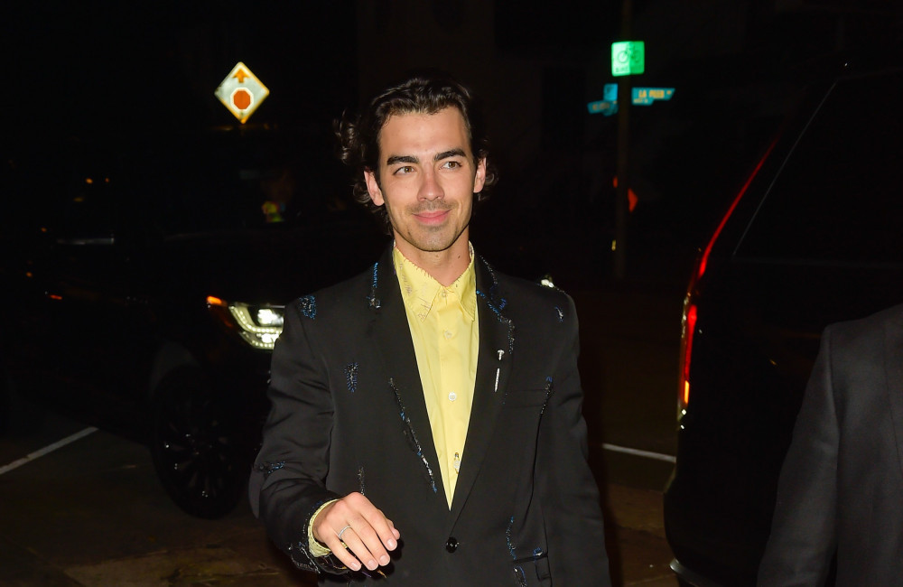 Joe Jonas's Reaction To Couple Fighting Over Him Joe Jonas's Reaction To Couple Fighting Over Him