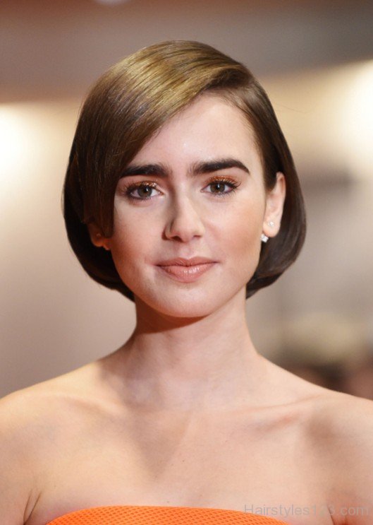 Lily Collins' Beauty Look: Bob Haircut, Bushy Brows, And Nude Lips Lily Collins' Beauty Look: Bob Haircut, Bushy Brows, And Nude Lips