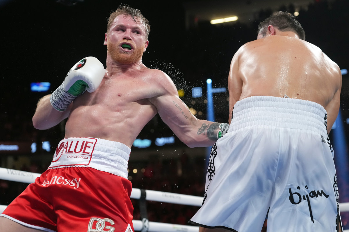 NYC Buzz: Canelo And Charlo Face Off Ahead Of Undisputed Title Bout NYC Buzz: Canelo And Charlo Face Off Ahead Of Undisputed Title Bout