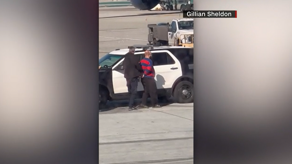 Passenger's Mid-Flight Exit Door Attempt Diverts Tokyo-Seattle Flight Passenger's Mid-Flight Exit Door Attempt Diverts Tokyo-Seattle Flight