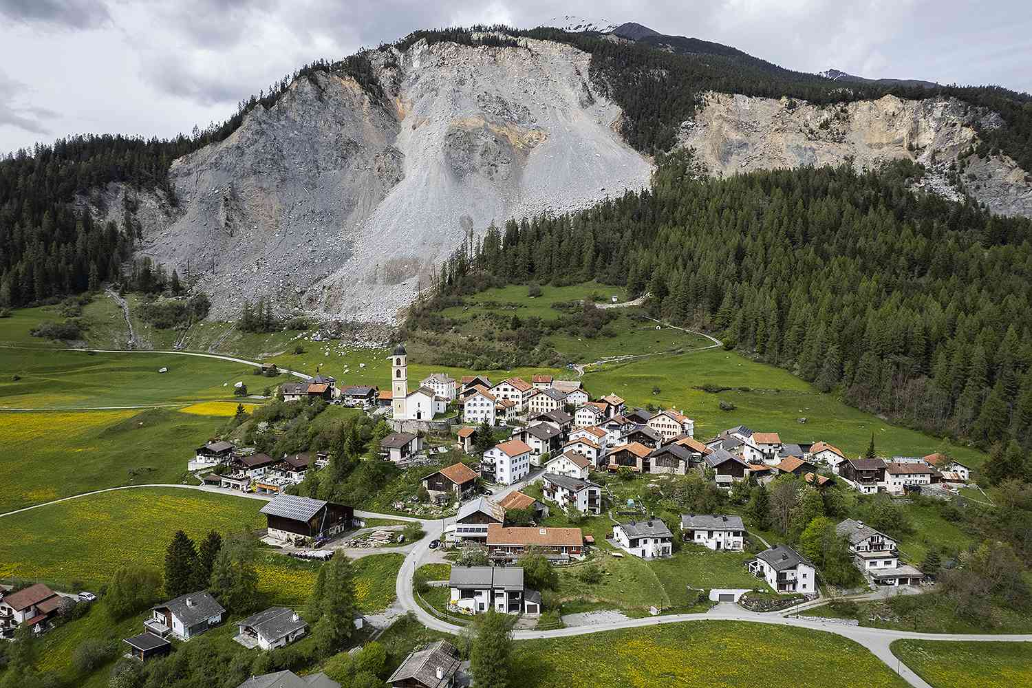 Swiss Alpine Village Faces Landslide Risk: Livestock Evacuated By Hoof And Helicopter Swiss Alpine Village Faces Landslide Risk: Livestock Evacuated By Hoof And Helicopter