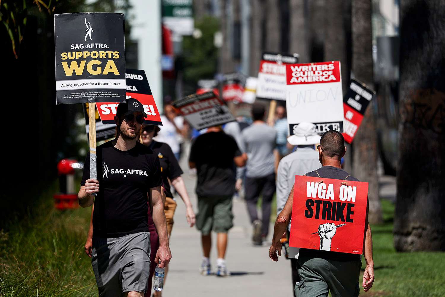 WGA And SAG-AFTRA Strike: A Complete Hollywood Production Halt WGA And SAG-AFTRA Strike: A Complete Hollywood Production Halt